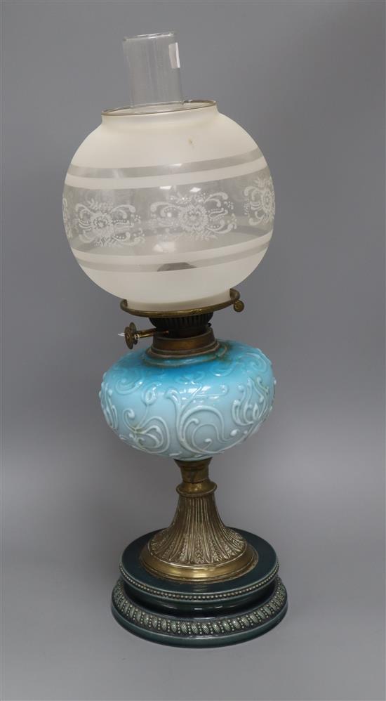 An Edwardian opaque blue glass and brass oil lamp overall height 57cm
